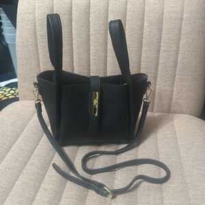 Adorable black leather crossbody bag